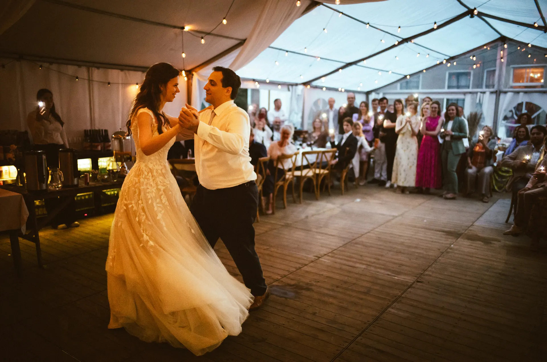 Aruna and Asterios dancing together during their wedding celebration